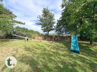 Jardin de l'établissement Tranquiloue - Maison Familiale 6 min du Puy du Fou