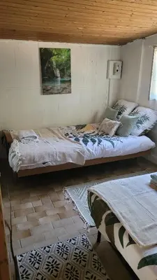 Un ou plusieurs lits dans un hébergement de l'établissement Chambre atypique