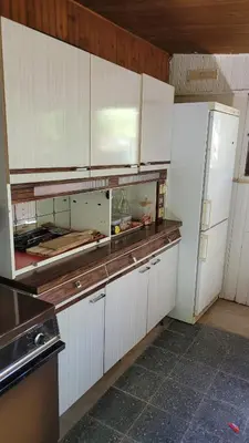 Cuisine ou kitchenette dans l'établissement Chambre atypique