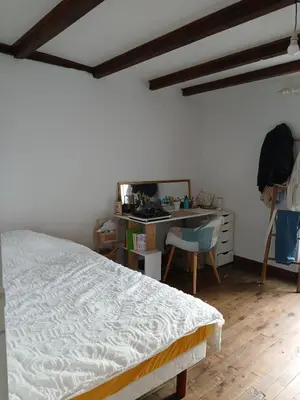 Un ou plusieurs lits dans un hébergement de l'établissement Maison lac