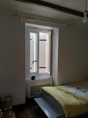 Un ou plusieurs lits dans un hébergement de l'établissement Maison lac