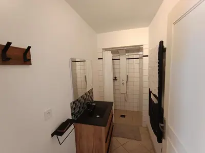 Salle de bains dans l'établissement Aux lits de la loire