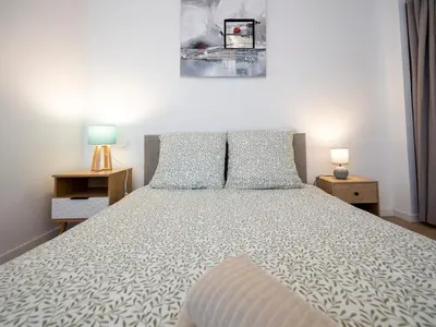 Un ou plusieurs lits dans un hébergement de l'établissement La Maison Céleste Jardin et Charme en hauteur