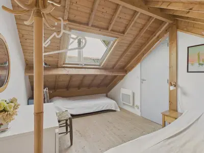 Un ou plusieurs lits dans un hébergement de l'établissement Maison avec accès privatif direct à la plage pour 6