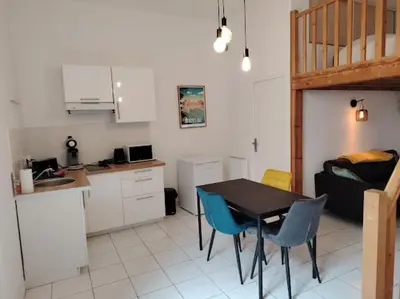 Cuisine ou kitchenette dans l'établissement Le Cocon du Château