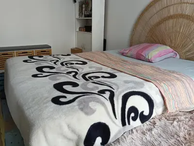 Un ou plusieurs lits dans un hébergement de l'établissement Mina Room