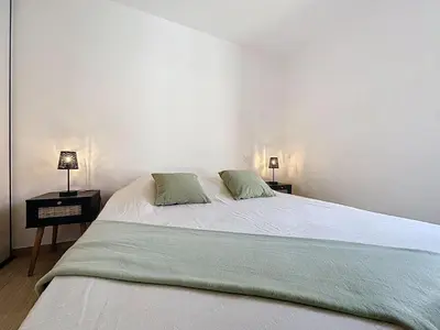 Un ou plusieurs lits dans un hébergement de l'établissement Holiday Home Les Musardises by Interhome