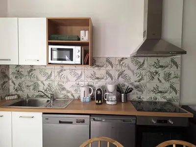 Cuisine ou kitchenette dans l'établissement ღ Pirates des Caraïbes - Parking, Terrasse, Wifi