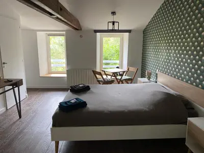 Un ou plusieurs lits dans un hébergement de l'établissement chambre d'hôte Céleste