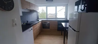 Cuisine ou kitchenette dans l'établissement Appartement lumineux et cosy