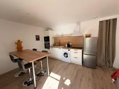 Cuisine ou kitchenette dans l'établissement Comme à la maison