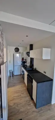 Cuisine ou kitchenette dans l'établissement Sublime Appartement rdc T2 Proche mer et parc