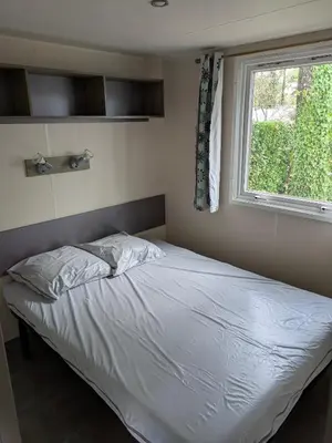 Un ou plusieurs lits dans un hébergement de l'établissement Mobil home Phoenix 6 places
