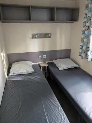 Un ou plusieurs lits dans un hébergement de l'établissement Mobil home Phoenix 6 places