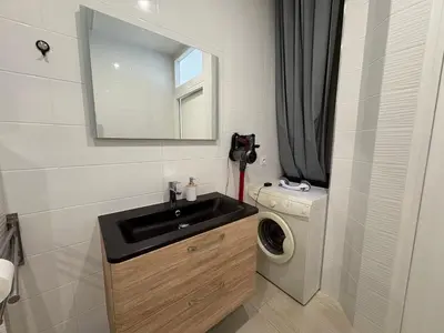 Salle de bains dans l'établissement Bel appartement à 650m de la plage avec WIFI et parking - FR-1-323-589
