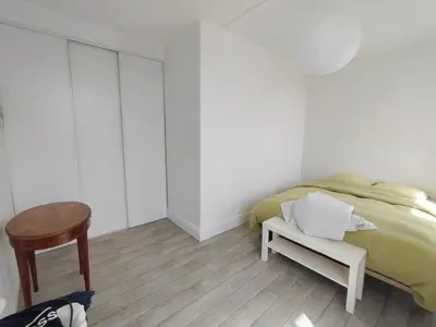 Un ou plusieurs lits dans un hébergement de l'établissement Charmant appartement Pornic