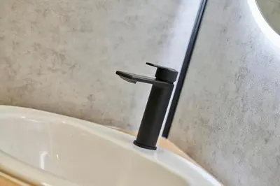 Salle de bains dans l'établissement Les Deux Estrades Confort, Panache et Netflix