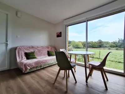 Un ou plusieurs lits dans un hébergement de l'établissement Gîte et chambre d'hôte pour 2 personnes dans Mon Savoureux Jardin