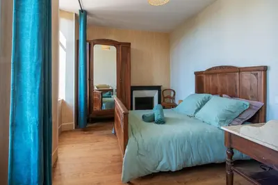Un ou plusieurs lits dans un hébergement de l'établissement La Maison du Bonheur - Grand Jardin