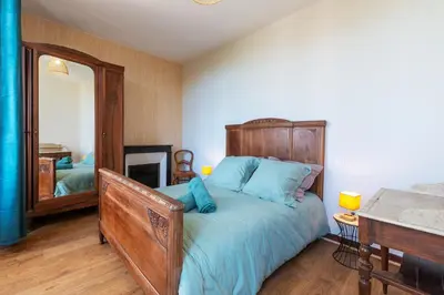Un ou plusieurs lits dans un hébergement de l'établissement La Maison du Bonheur - Grand Jardin