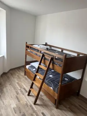 Un ou plusieurs lits dans un hébergement de l'établissement Appartement meublé tout équipé - Mesnard-La-Barotière