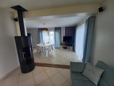 Coin salon dans l'établissement Charmante Maison Familiale Agréable Extérieur