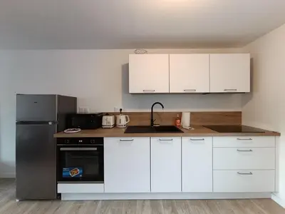 Cuisine ou kitchenette dans l'établissement Charmant Studio à St Marc Sur Mer
