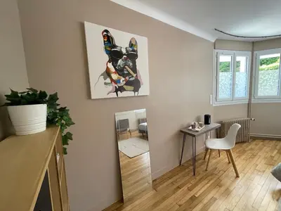 Coin salon dans l'établissement Chambre cozy avec sdb privée à 7min de la gare