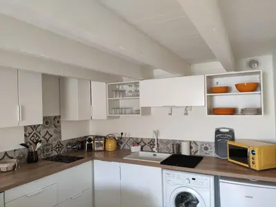 Cuisine ou kitchenette dans l'établissement Chez madame Hulotte