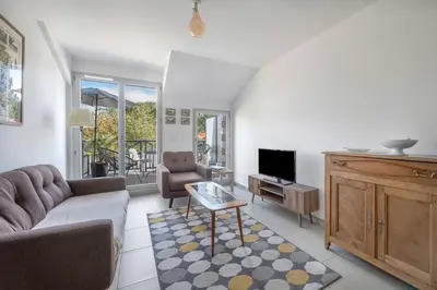 Coin salon dans l'établissement Appartement proche plage et bourg