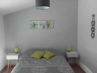 Un ou plusieurs lits dans un hébergement de l'établissement Gîte La Rocardière XL 10 personnes