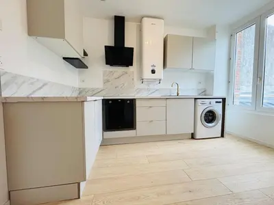 Cuisine ou kitchenette dans l'établissement Charmant appartement tout confort