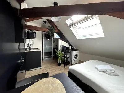 Cuisine ou kitchenette dans l'établissement Le Studio - Cosy et fonctionnel - plein centre