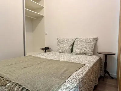 Un ou plusieurs lits dans un hébergement de l'établissement Appartement Cosy Bord de Lac