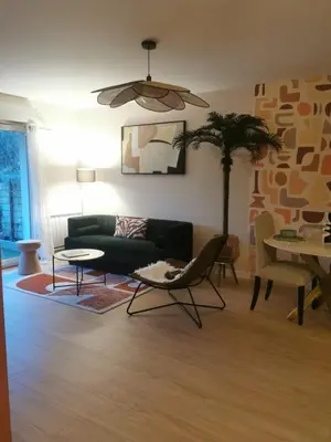 Coin salon dans l'établissement Beautiful cocooning appartement