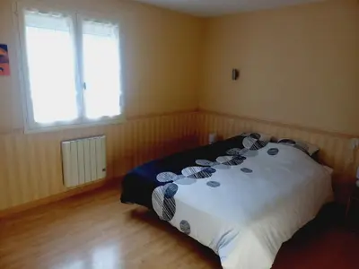 Un ou plusieurs lits dans un hébergement de l'établissement maison entiere spatieuse et au calme 6 couchages