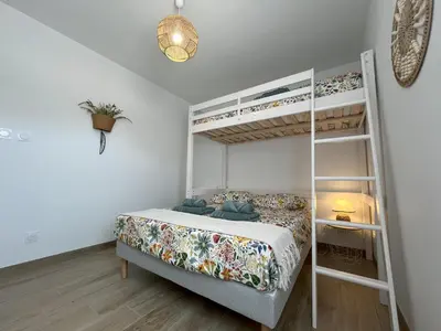 Un ou plusieurs lits dans un hébergement de l'établissement Rincon del Mar - Maison & spa privatif