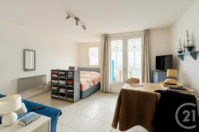 Un ou plusieurs lits dans un hébergement de l'établissement Waterfront apartment - Plage des Mouettes