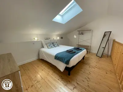 Un ou plusieurs lits dans un hébergement de l'établissement Location Studio avec Piscine Chauffée en Vendée - FR-1-426-595