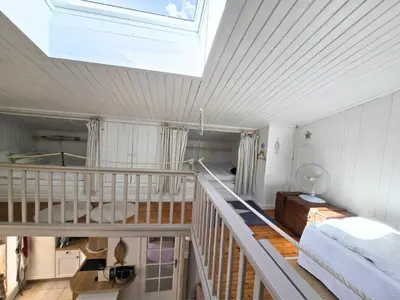 Un ou plusieurs lits dans un hébergement de l'établissement Charmante maison 7 couchages à 300m de la plage, parking et animaux admis - FR-1-777-45