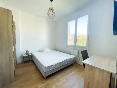 Un ou plusieurs lits dans un hébergement de l'établissement Appartement cosy proche Nantes