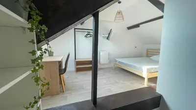 Un ou plusieurs lits dans un hébergement de l'établissement Appartement cosy proche Nantes