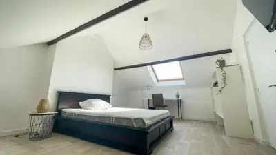 Un ou plusieurs lits dans un hébergement de l'établissement Appartement cosy proche Nantes