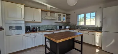 Cuisine ou kitchenette dans l'établissement gîte house in Vallet