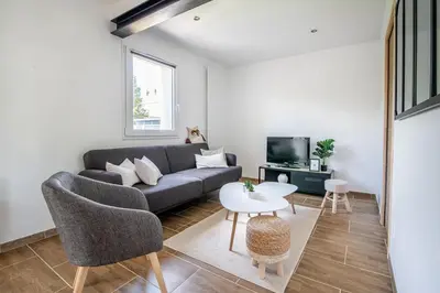 Télévision ou salle de divertissement dans l'établissement L'Escale 10, maison familiale et lumineuse près du PuyDuFou