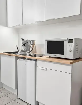 Cuisine ou kitchenette dans l'établissement Studio cosy proche Nantes - parking