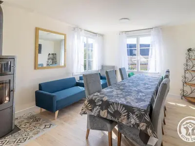 Coin salon dans l'établissement Gîte familial pour 8 pers. à Saint Aubin de Luigné - FR-1-622-117
