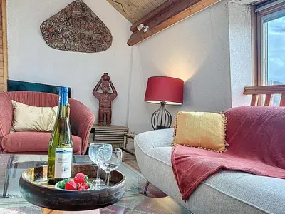 Coin salon dans l'établissement Apartment La Fontaine by Interhome