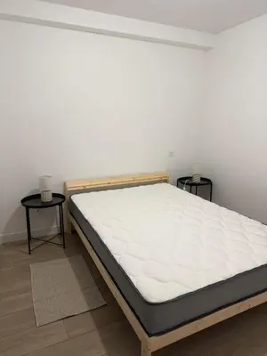 Un ou plusieurs lits dans un hébergement de l'établissement Comme chez soi