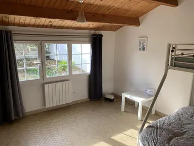 Un ou plusieurs lits dans un hébergement de l'établissement Maison de vacances , idéale pour famille avec accès plage et spa